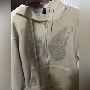 tan , jacket , butterfly decor , worn once, comfy